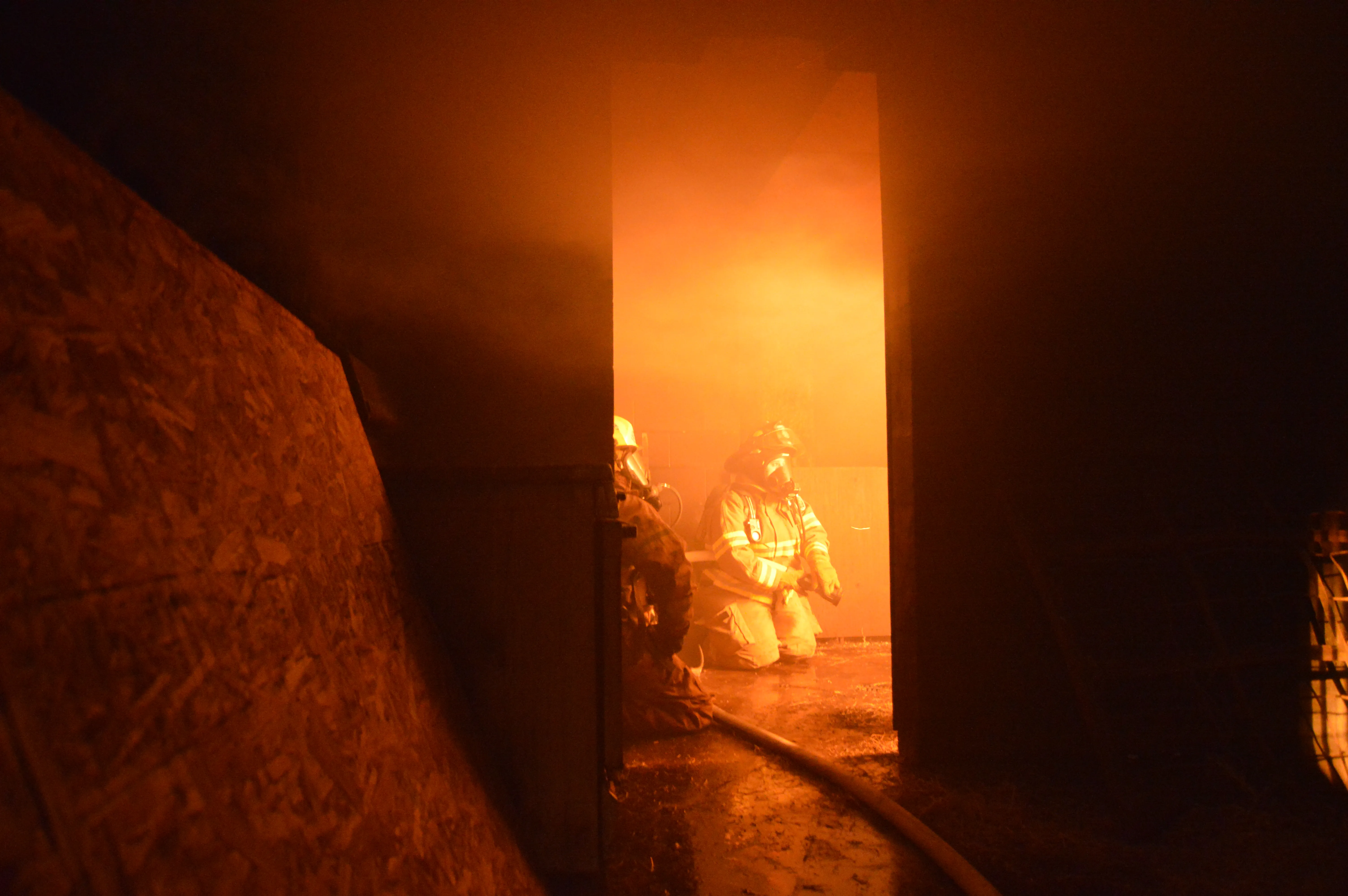Crew operating from Ladder 132 bucket at height